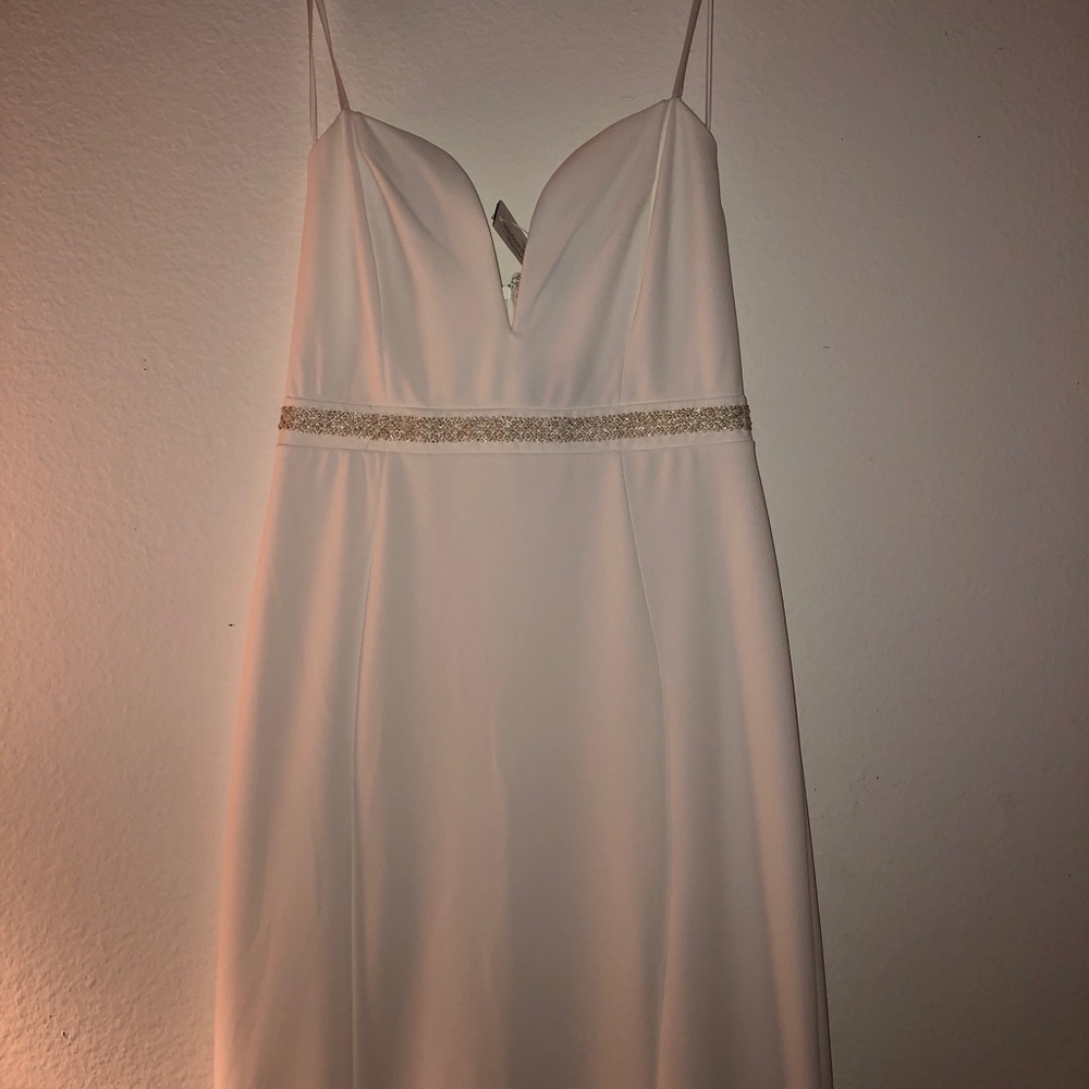 white deep v neck long formal dress with pearls